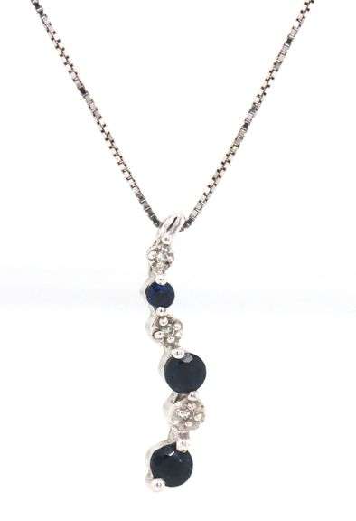 10kt White gold blue sapphire and diamond pendant on chain