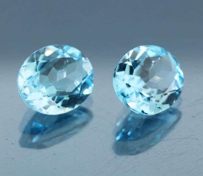 Huge! 12x10mm pair of swiss blue Topaz weighing 9.10 carats!