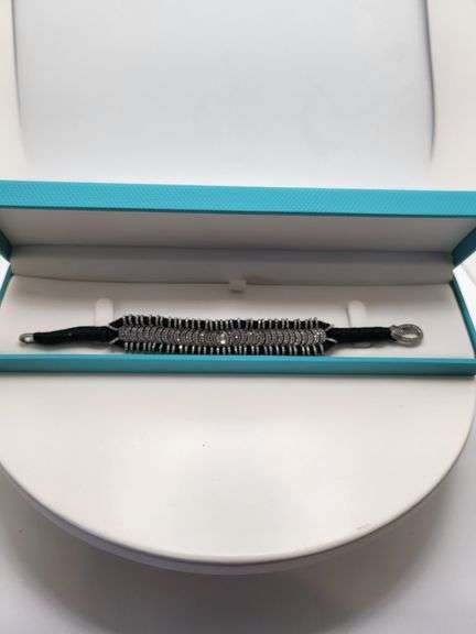 Very unique diamond bracelet in silver, hand woven cloth