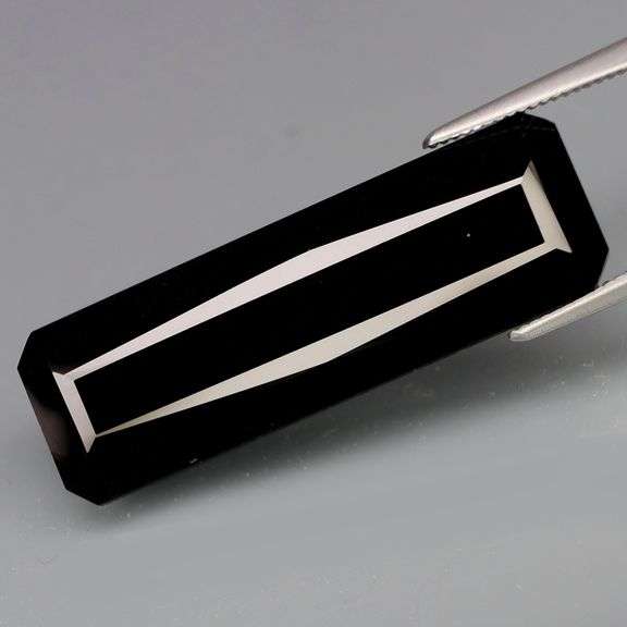 Elegant 16.68ct silky black Loas Tektite