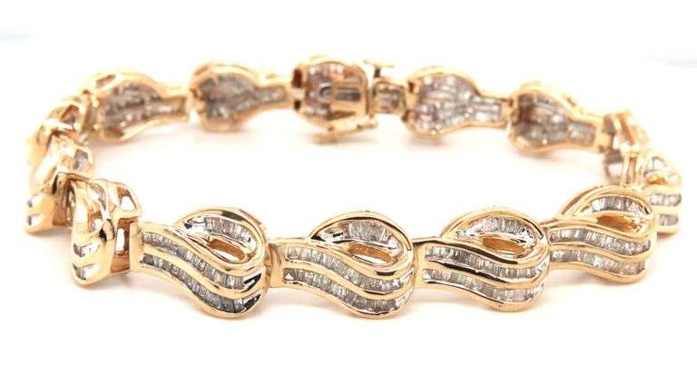 14kt Yellow gold 4.50ctw baguette diamond wave bracelet