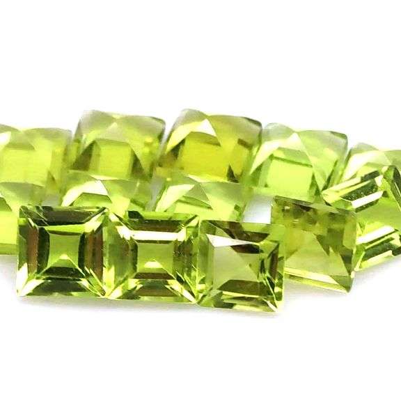 High fire brightly colored 9.55ct Peridot set!