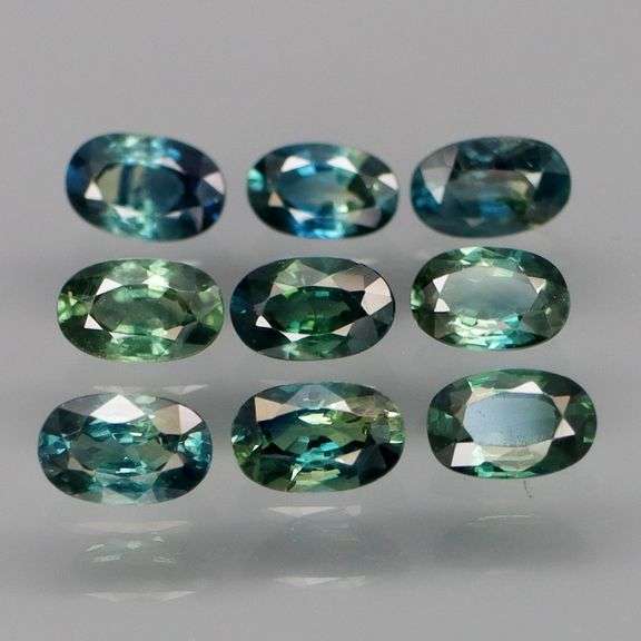 Heated only! 3.23ct blue green Sapphire set
