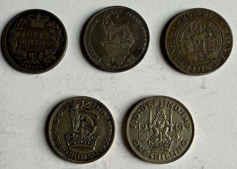Five Different English Shillings.