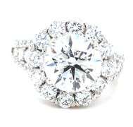 18kt White gold 3.04ct round brilliant cut lab grown diamond in natural diamond halo setting