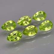Dazzling 5.68ct untreated apple green Peridot set