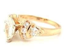 14kt Yellow gold 1ctw marquise and 0.60ctw PS and round side engagement ring