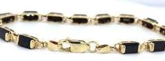 14kt Yellow gold emerald cut black onyx station bracelet