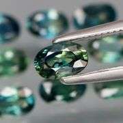 Heated only! 3.23ct blue green Sapphire set