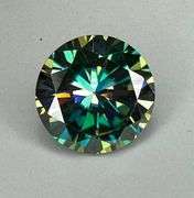 Dazzling 6.5 Deep Emerald Green Moissanite Solitaire