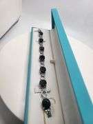 Very fine Black diamond 45.22 ctw with diamond accent set in silver ring, GGV certified