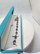 A true statement of elegance of Oval Cabochon Tanzanite Bracelet in Silver – GGA Certified. Set in l