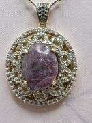 Extremely fine quality one Cabochon Ruby and Sapphire pendent in silver, GGA certfied