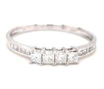 14kt White gold princess cut channel set diamond band