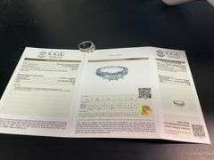 CERTIFIED LADIES 10K WHITE GOLD AND DIAMOND RING.