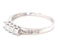 14kt White gold princess cut channel set diamond band