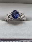 Very fine Tanzanite ring in silver , GGA certified with diamond