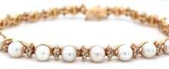 14kt Yellow gold pearl and diamond link bracelet