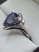 Very fine Tanzanite ring in silver , GGA certified with diamond
