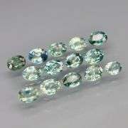 Exotic 2.13ct 14pc single vein blue green Sapphire set