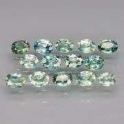 Exotic 2.13ct 14pc single vein blue green Sapphire set