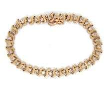 14kt Yellow gold round brilliant cut diamond S link bracelet