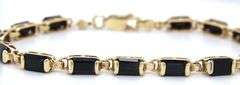 14kt Yellow gold emerald cut black onyx station bracelet