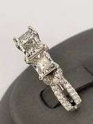 CERTIFIED LADIES 10K WHITE GOLD AND DIAMOND RING.