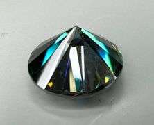 Dazzling 6.5 Deep Emerald Green Moissanite Solitaire