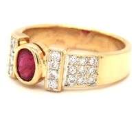 14kt Yellow gold 0.50ct oval ruby and 0.25ctw diamond ring