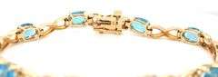 14kt Yellow gold oval blue topaz bracelet