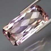 Absolutely stunning 9.86ct lightly saturated Bolivian Ametrine