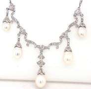 Vintage style pearl drop and diamond accent necklace