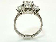 Sparkling 5.5 Ctw 3 Stone Emerald Cut Ice White Fire Moissanite Ring