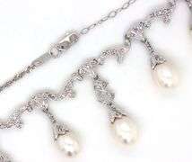 Vintage style pearl drop and diamond accent necklace