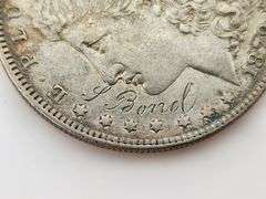 1879 Morgan Silver Dollar, "Countermark"