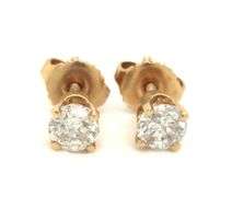 One pair of 14kt yellow gold round brilliant cut diamond stud earrings