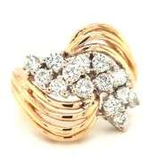 14kt Yellow gold 1.15ctw diamond cluster ring with a bypass shank