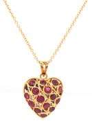 18kt Yellow gold reversible sapphire and ruby heart shaped pendant on chain