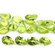Dazzling 9.10ct untreated apple green Peridot set