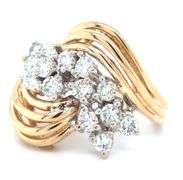 14kt Yellow gold 1.15ctw diamond cluster ring with a bypass shank