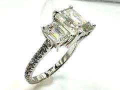 Sparkling 5.5 Ctw 3 Stone Emerald Cut Ice White Fire Moissanite Ring