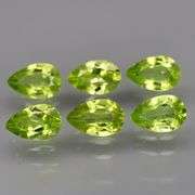 Dazzling 5.68ct untreated apple green Peridot set