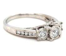 14kt White gold 0.85ctw 3 stone Illusion set engagement ring