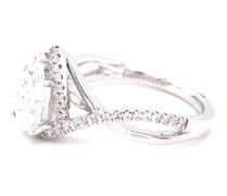 14kt White gold 1.07ct lab grown diamond pear shaped in Gabriel & Co 0.26ctw halo open Infinity diam