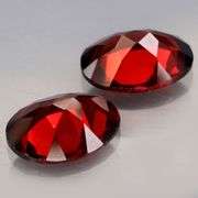 Mozambique red! 4.51ct matched oval cut Garnet pair!