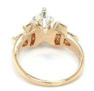 14kt Yellow gold 1ctw marquise and 0.60ctw PS and round side engagement ring