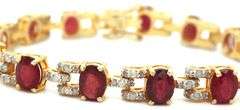 Fabulous 21.30CTW Oval Faceted Ruby & Diamond Bracelet in 14KYellow Gold Over Sterling Silver