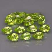 Dazzling 8.60ct untreated apple green Peridot set