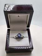 Very fine Natural Tanzanite 2.30 ctw with diamond accent set in silver ring, GGAcertified